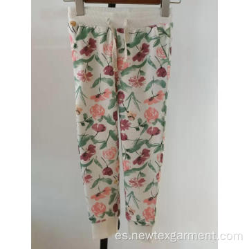 pantalón casual con estampado de flores y costuras en la cintura